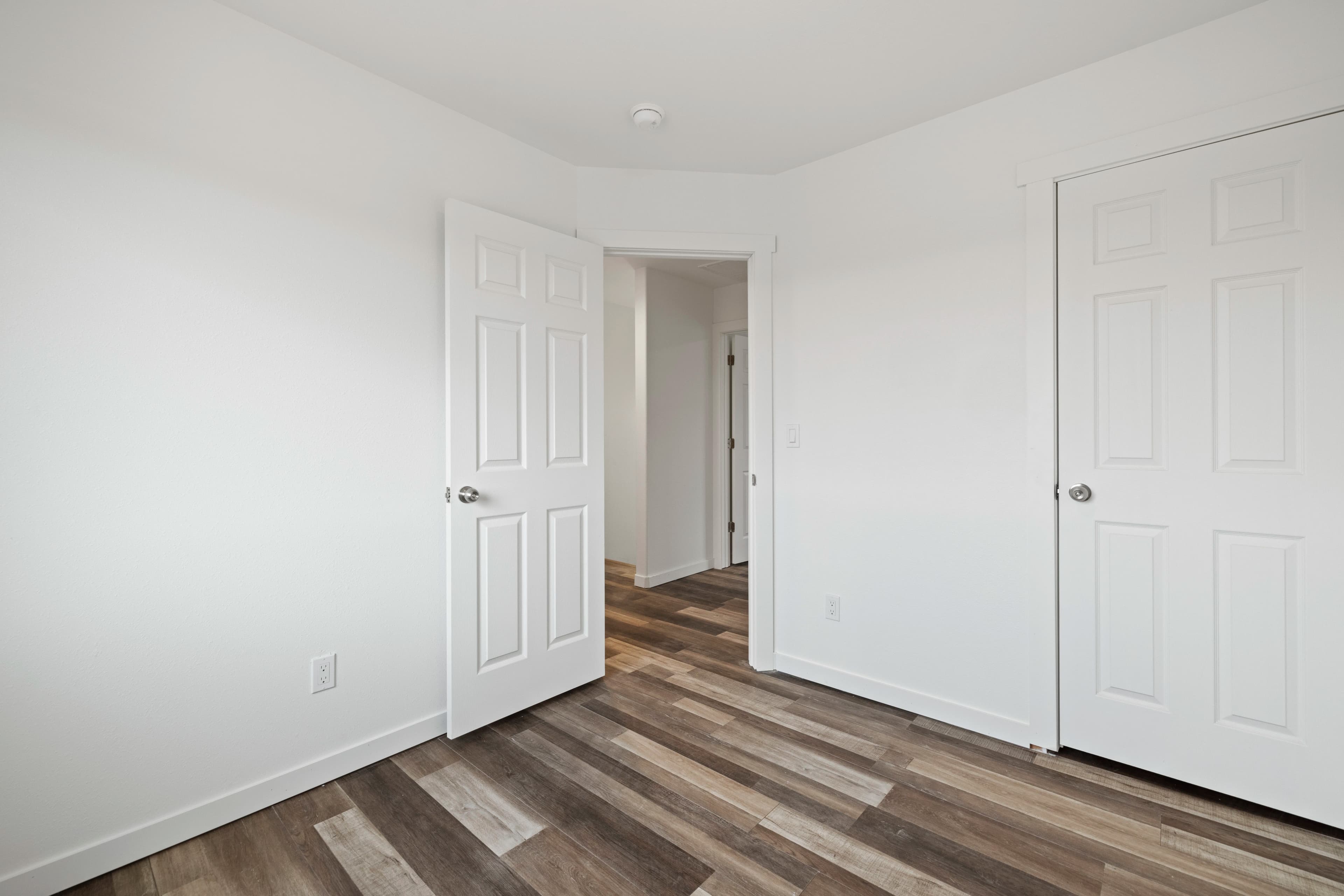 Primary bedroom inside a new-construction Marina Shore Villas townhome